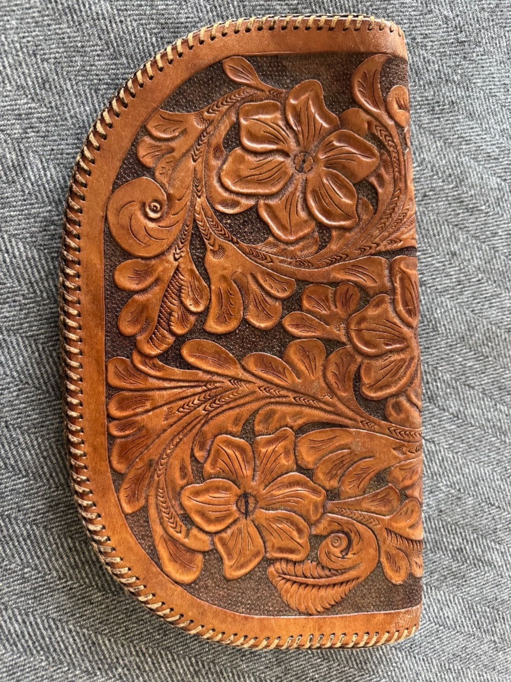 VINTAGE HAND TOOLED LEATHER CLUTCH WITH WHIPSTITCHING SURROUNDING EDGES